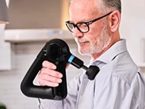 pistolet massage theragun epaule